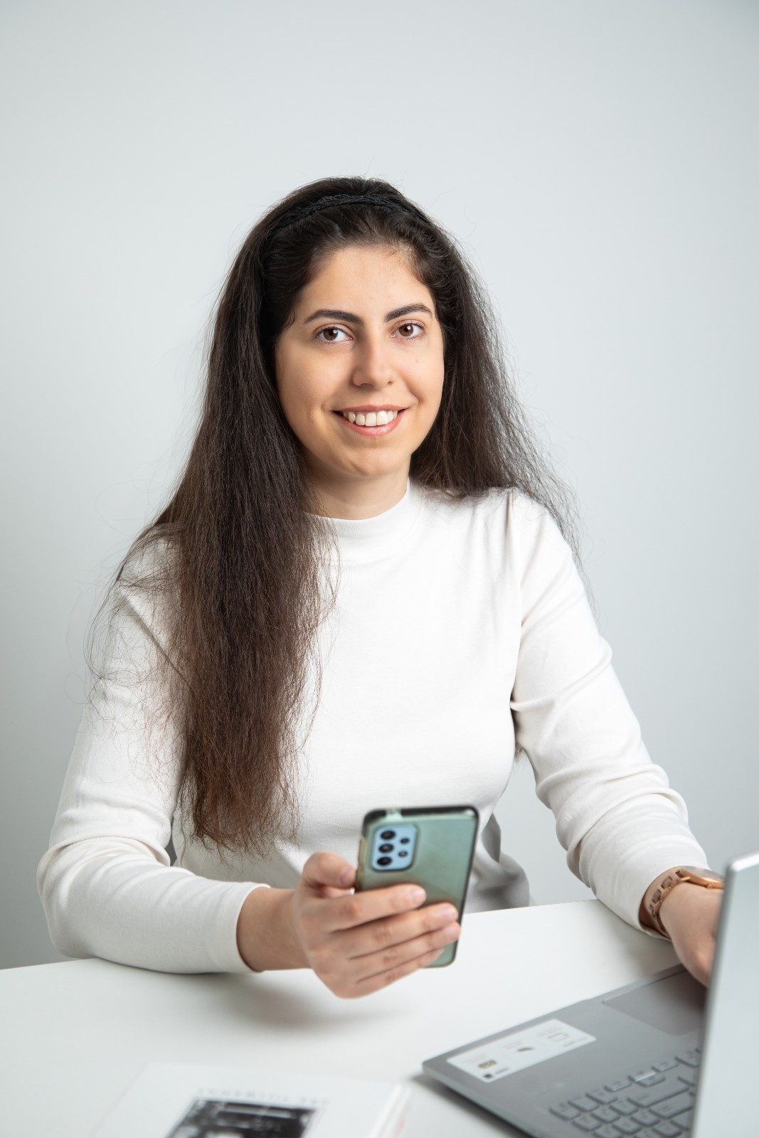Miruna Agopian working at her laptop